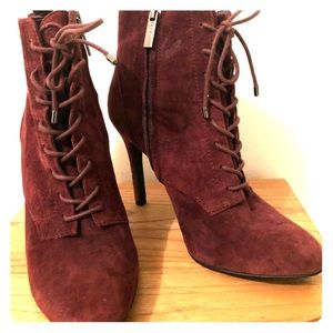 Dark purple suede booties.